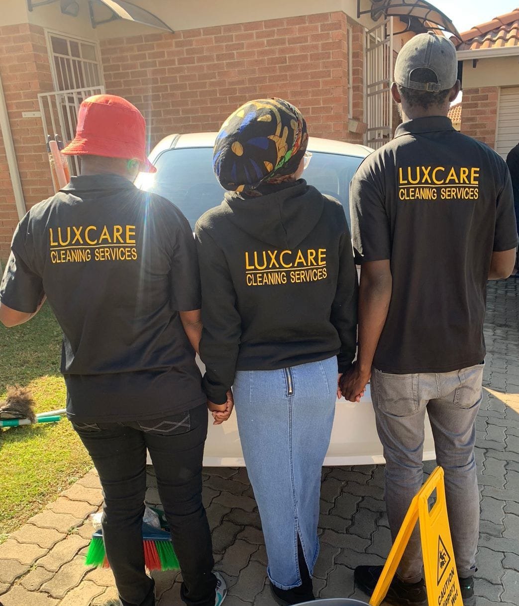 Luxcare team showing branding